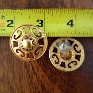 Contemporary style, casual earrings in brushed gold tone.